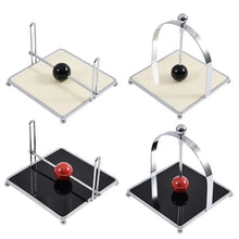 Load image into Gallery viewer, AXO Stainless Steel Paper Napkin/Serviette Holders by Allthingscurated feature a stunning range holders in a minimalist design with weighted orb in red and black, ensuring your paper napkins stay perfectly in place. Elevate your dining experience with these functional holders that are perfect for buffet tables and outdoor dining.
