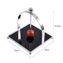 Load image into Gallery viewer, AXO Stainless Steel Paper Napkin/Serviette Holders by Allthingscurated feature a stunning range holders in a minimalist design with weighted orb in red and black, ensuring your paper napkins stay perfectly in place. Elevate your dining experience with these functional holders that are perfect for buffet tables and outdoor dining. Featured here is a tall style with a black base and red orb.