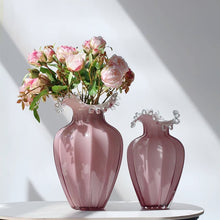 Load image into Gallery viewer, Anais Pink Beaded Vases by Allthingscurated are crafted from handblown glasses. Featuring a curvaceous body with an asymmetrical beaded rim that flares back like a collar.  Its captivating shape and romantic pink hue makes it a statement piece and a glamorous addition to your vase collection. Available in small and large size.