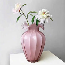 Load image into Gallery viewer, Anais Pink Beaded Vases by Allthingscurated are crafted from handblown glasses. Featuring a curvaceous body with an asymmetrical beaded rim that flares back like a collar.  Its captivating shape and romantic pink hue makes it a statement piece and a glamorous addition to your vase collection. Available in small and large size.