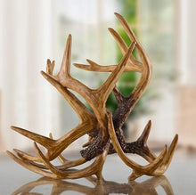 Load image into Gallery viewer, Antler Wine Bottle Holder by Allthingscurated is hand-crafted from resin and hand-painted to emulate the look of genuine antlers. Beautiful and sculptural, it’s a great gift for any occasion as well as a perfect addition to give your winter tablescape a cabin vibe. On its own, it’s a decorative, ornamental piece that gives a luxurious look to your mantel, tabletop or shelf. Measuring approximately 33cm or 13 inches in height, 35cm or 13.7 inches wide and a depth of 23cm or 9 inches.