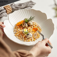 Load image into Gallery viewer, Audri Flower Serving Bowl by Allthingscurated featured a distinct flower design with petal edges and vivid texture surface in neutral white. The low bowl design comes in 3 sizes.