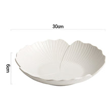 Load image into Gallery viewer, Audri Flower Serving Bowl by Allthingscurated featured a distinct flower design with petal edges and vivid texture surface in neutral white. The low bowl design comes in 3 sizes. Featured here is a large size measuring 30cm or 11.7 inches in width and 6cm or 2.3 inches in height.