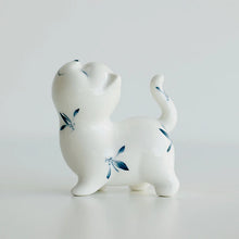 Load image into Gallery viewer, Petite Butterfly Orchid Porcelain by Allthingscurated is handmade with exquisite craftsmanship. Featuring beautiful, hand-painted blue butterfly orchids on white porcelain, the dainty design exudes an elegant charm and a touch of playfulness with its naughty and oh-so-cute expression. Small yet exquisite, it will charm any cat lovers and bring joy to any room.