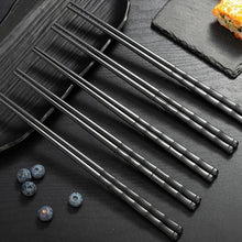 Load image into Gallery viewer, Bamboo Design Chinese Chopsticks by Allthingscurated are made from durable fiberglass polymer and heat-resistance. Stylish and sleek, the tapered end features an anti-slip design for easy and secure food picking. Enjoy 10 pairs of these high-quality chopsticks for all your Asian cuisine needs.