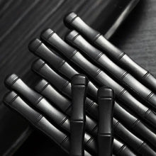 Load image into Gallery viewer, Bamboo Design Chinese Chopsticks by Allthingscurated are made from durable fiberglass polymer and heat-resistance. Stylish and sleek, the tapered end features an anti-slip design for easy and secure food picking. Enjoy 10 pairs of these high-quality chopsticks for all your Asian cuisine needs.