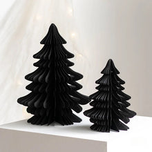 Load image into Gallery viewer, Honeycomb Christmas Trees by Allthingscurated featured a set of 2 sculptural trees expertly crafted with paper to bring a pretty and festive touch to your Yuletide decorations. These delightful paper decorations are simple to assemble and store away, making them reusable year after year. Comes in 2 styles and 4 color groupings of Red, Brown, White and Black. Each set consists of a small and large tree. Featured here is a set of Black Trees.