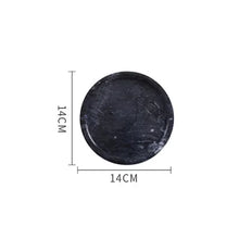 Load image into Gallery viewer, Marble Round Trays by Allthingscurated are crafted from natural marble stone that exude timeless beauty and elegance. The stylish trays are versatile and perfect additions to your home. Use it as a desk organizer, a vanity tray or simply as a serving tray. It holds everything you need with its functionality. Featured here is a black tray in 14cm or 5.5 inches.