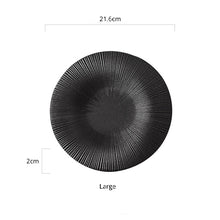 Load image into Gallery viewer, Line Textured Dinner Plates by Allthingscurated featured distinct bold lines that exude modernity and timelessness. Come in stylish black and white, they mix and match easily with your existing dinnerware and suitable for a wide range of occasions. Come in 2 sizes. Featured here is the large plate in Black.