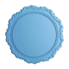 Load image into Gallery viewer, Embossed Lace Round Silicone Placemat by Allthingscurated are expertly crafted from high-quality, food-grade silicone. Available in 7 trendy colors with an embossed lace pattern, this placemat adds texture and charm to your dining table, making your meals more presentable effortlessly stylish. Featured here is placemat in Blue.