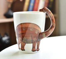 Load image into Gallery viewer, 3D Dinosaur Mug Collection by Allthingscurated consists of 8 unique dinosaur designs with each mug holding a generous capacity of 400ml or 13.5 ounce. Made of high-quality porcelain, they are the perfect gift for dinosaur lovers. This design seen here is Brachiosaurus.