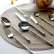 Load image into Gallery viewer, Bright Silver Stainless Steel flatware by Allthingscurated crafted from high-quality stainless steel with a forged construction ensures durability.  It has a bright silver mirror finish that will add a touch of elegance to any meal.