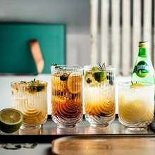 Load image into Gallery viewer, Brix U Design Drinking Glass by Allthingscurated is made of lead-free, high-quality glass and spots a sexy U shape ribbed pattern that provides a comfortable grip when holding. These glasses is the perfect combination of style and functionality, making it suitable for everyday use and a wide variety of beverage from iced café lattes to cocktails, juices and whiskeys. It’s also dishwasher-safe for easy cleaning. Comes in 370ml, 410ml and 430ml or, 12 ounce, 14 ounce and 14.5 ounce.