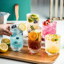 Load image into Gallery viewer, Brix U Design Drinking Glass by Allthingscurated is made of lead-free, high-quality glass and spots a sexy U shape ribbed pattern that provides a comfortable grip when holding. These glasses is the perfect combination of style and functionality, making it suitable for everyday use and a wide variety of beverage from iced café lattes to cocktails, juices and whiskeys. It’s also dishwasher-safe for easy cleaning. Comes in 370ml, 410ml and 430ml or, 12 ounce, 14 ounce and 14.5 ounce.