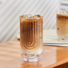 Load image into Gallery viewer, Brix U Design Drinking Glass by Allthingscurated is made of lead-free, high-quality glass and spots a sexy U shape ribbed pattern that provides a comfortable grip when holding. These glasses is the perfect combination of style and functionality, making it suitable for everyday use and a wide variety of beverage from iced café lattes to cocktails, juices and whiskeys. It’s also dishwasher-safe for easy cleaning. Comes in 370ml, 410ml and 430ml or, 12 ounce, 14 ounce and 14.5 ounce.