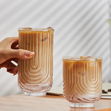 Load image into Gallery viewer, Brix U Design Drinking Glass by Allthingscurated is made of lead-free, high-quality glass and spots a sexy U shape ribbed pattern that provides a comfortable grip when holding. These glasses is the perfect combination of style and functionality, making it suitable for everyday use and a wide variety of beverage from iced café lattes to cocktails, juices and whiskeys. It’s also dishwasher-safe for easy cleaning. Comes in 370ml, 410ml and 430ml or, 12 ounce, 14 ounce and 14.5 ounce.