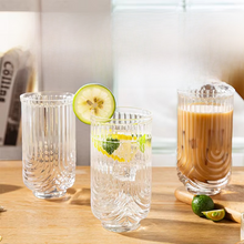 Load image into Gallery viewer, Brix U Design Drinking Glass by Allthingscurated is made of lead-free, high-quality glass and spots a sexy U shape ribbed pattern that provides a comfortable grip when holding. These glasses is the perfect combination of style and functionality, making it suitable for everyday use and a wide variety of beverage from iced café lattes to cocktails, juices and whiskeys. It’s also dishwasher-safe for easy cleaning. Comes in 370ml, 410ml and 430ml or, 12 ounce, 14 ounce and 14.5 ounce.