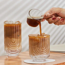 Load image into Gallery viewer, Brix U Design Drinking Glass by Allthingscurated is made of lead-free, high-quality glass and spots a sexy U shape ribbed pattern that provides a comfortable grip when holding. These glasses is the perfect combination of style and functionality, making it suitable for everyday use and a wide variety of beverage from iced café lattes to cocktails, juices and whiskeys. It’s also dishwasher-safe for easy cleaning. Comes in 370ml, 410ml and 430ml or, 12 ounce, 14 ounce and 14.5 ounce.