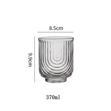 Load image into Gallery viewer, Brix U Design Drinking Glass by Allthingscurated is made of lead-free, high-quality glass and spots a sexy U shape ribbed pattern that provides a comfortable grip when holding. These glasses is the perfect combination of style and functionality, making it suitable for everyday use and a wide variety of beverage from iced café lattes to cocktails, juices and whiskeys. It’s also dishwasher-safe for easy cleaning. Shown here is short tumbler in 370ml or 12 ounce.