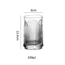 Load image into Gallery viewer, Brix U Design Drinking Glass by Allthingscurated is made of lead-free, high-quality glass and spots a sexy U shape ribbed pattern that provides a comfortable grip when holding. These glasses is the perfect combination of style and functionality, making it suitable for everyday use and a wide variety of beverage from iced café lattes to cocktails, juices and whiskeys. It’s also dishwasher-safe for easy cleaning. Shown here is tall glass in 430ml or 14.5 ounce.