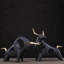 Load image into Gallery viewer, Brooklyn Bull Sculptures by Allthingscurated capture the elegance and dramatic aura of the auspicious animal in a sleek, modern design with matte black finish and gold-accented horns. A visually-appealing and timeless collection, it’s a fashionable piece to add to any contemporary home and spaces. And perfect as a gift for those with a Taurus horoscope or Chinese Ox zodiac sign.