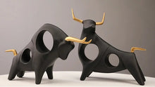 Load image into Gallery viewer, Brooklyn Bull Sculptures by Allthingscurated capture the elegance and dramatic aura of the auspicious animal in a sleek, modern design with matte black finish and gold-accented horns. A visually-appealing and timeless collection, it’s a fashionable piece to add to any contemporary home and spaces. And perfect as a gift for those with a Taurus horoscope or Chinese Ox zodiac sign.