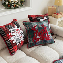 Load image into Gallery viewer, Tartan Christmas Cushion Covers by Allthingscurated spots classic tartan print with embroidered snowflake, jingle bell and holiday greetings. Timeless and stylish, these covers are easy to mix and match with other solid-colored or festive pillows. They are perfect for creating a festive ensemble for your sofa or favorite couch to experience the magic of the holiday season.