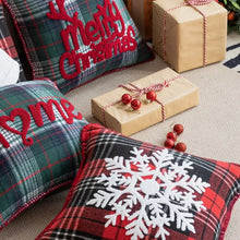 Load image into Gallery viewer, Tartan Christmas Cushion Covers by Allthingscurated spots classic tartan print with embroidered snowflake, jingle bell and holiday greetings. Timeless and stylish, these covers are easy to mix and match with other solid-colored or festive pillows. They are perfect for creating a festive ensemble for your sofa or favorite couch to experience the magic of the holiday season.