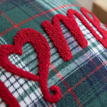 Load image into Gallery viewer, Tartan Christmas Cushion Covers by Allthingscurated spots classic tartan print with embroidered snowflake, jingle bell and holiday greetings. Timeless and stylish, these covers are easy to mix and match with other solid-colored or festive pillows. They are perfect for creating a festive ensemble for your sofa or favorite couch to experience the magic of the holiday season.