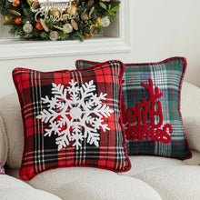 Load image into Gallery viewer, Tartan Christmas Cushion Covers by Allthingscurated spots classic tartan print with embroidered snowflake, jingle bell and holiday greetings. Timeless and stylish, these covers are easy to mix and match with other solid-colored or festive pillows. They are perfect for creating a festive ensemble for your sofa or favorite couch to experience the magic of the holiday season.