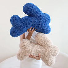 Load image into Gallery viewer, Cozy Teddy Bunny Pillow by Allthingscurated shaped like a cute bunny is sewn from soft, fluffy teddy fabric. The hug pillow is cute, cuddly and oh-so-cozy. Its playful shape will bring a quirky charm to any room. Available in white, sand, red and blue.