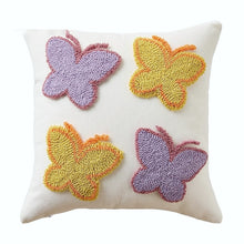 Load image into Gallery viewer, Spring Melody Embroidered Cushion Covers by Allthingscurated feature charming seasonal details to transition your home into Spring and Easter effortlessly. Each cover showcases meticulous embroidery to add depth and visual interest to your sofa and furniture. Design here featured 4 embroidered butterflies in lilac and yellow on 45 by 45cm or 15.6 by 15.6 inches white cover.