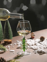 Load image into Gallery viewer, These charming Christmas Tree Stem Glass by Allthingscurated features a sculptural 3D design on the stem. Comes in classic green or bright white, it adds a festive vibe to your holiday gatherings. These glasses make thoughtful gifts for your loved ones.