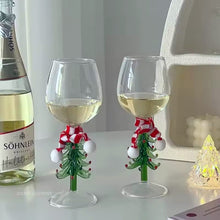 Load image into Gallery viewer, These charming Christmas Tree Stem Glass by Allthingscurated features a sculptural 3D design on the stem. Comes in classic green or bright white, it adds a festive vibe to your holiday gatherings. These glasses make thoughtful gifts for your loved ones.