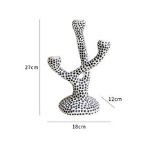 Load image into Gallery viewer, Whimsical Polka Dot Ceramic Candelabra by Allthingscurated combines abstract design with a touch of quirkiness, making it an aesthetically-pleasing piece for any modern and stylish homes. Perfect for lighting up your space with a touch of charm and personality; or as a decorative piece on its own.