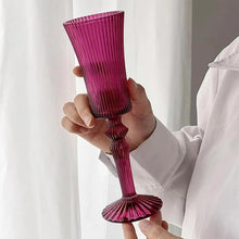 Load image into Gallery viewer, Cecily Flute Glasses by Allthingscurated feature a medieval-inspired vertical ridged design that provides a unique texture with an elegant touch. The long, sturdy stem ensures a steady hold while the jewel tones add a touch of sophistication to any celebration. Designed to complement your favorite wines, these glasses are perfect for entertaining and will brighten up any table.