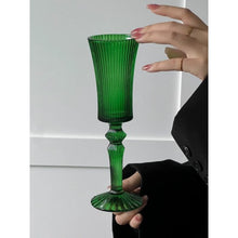 Load image into Gallery viewer, Cecily Flute Glasses by Allthingscurated feature a medieval-inspired vertical ridged design that provides a unique texture with an elegant touch. The long, sturdy stem ensures a steady hold while the jewel tones add a touch of sophistication to any celebration. Designed to complement your favorite wines, these glasses are perfect for entertaining and will brighten up any table.