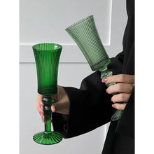 Load image into Gallery viewer, Cecily Flute Glasses by Allthingscurated feature a medieval-inspired vertical ridged design that provides a unique texture with an elegant touch. The long, sturdy stem ensures a steady hold while the jewel tones add a touch of sophistication to any celebration. Designed to complement your favorite wines, these glasses are perfect for entertaining and will brighten up any table.