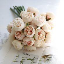 Load image into Gallery viewer, Silk Peony Bouquets by Allthingscurated are made of soft, realistic silk in 6 lovely colors to last through all seasons. Perfect for home décor or as a romantic wedding bouquet. Featured here is the color Champagne.