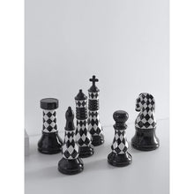 Load image into Gallery viewer, Checkered 6-piece Chess Set by Allthingscurated is both elegant and delightfully unique. Designed with a striking, graphic pattern in black and white, it adds a touch of sophistication to any space, whether your home décor style is modern or traditional. Made of porcelain, this decorative set is an ideal gift for any chess lovers.