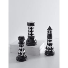 Load image into Gallery viewer, Checkered 6-piece Chess Set by Allthingscurated is both elegant and delightfully unique. Designed with a striking, graphic pattern in black and white, it adds a touch of sophistication to any space, whether your home décor style is modern or traditional. Made of porcelain, this decorative set is an ideal gift for any chess lovers.