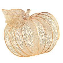 Load image into Gallery viewer, Pumpkin Vinyl Placemats by Allthingscurated are designed with perforated hollow patterns to create a unique texture and add dimension to your table setting. Made from durable PVC vinyl, they are stain-resistant and easy to maintain. Perfect for Thanksgiving and Halloween celebrations. Featured here is placemat in copper.