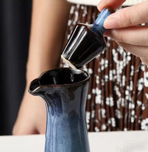 Load image into Gallery viewer, Japanese Style Ceramic Oil Vinegar Cruet by Allthingscurated is crafted from kiln-fired glazed porcelain with a glossy and smooth finish. Spots a tapered, elegant silhouette, it is perfect for storing and serving condiments from soy sauce and sesame oil, to olive oil and vingegar. Comes in 5 beautiful colors.