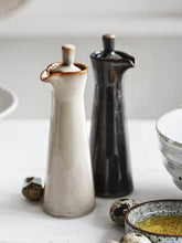 Load image into Gallery viewer, Japanese Style Ceramic Oil Vinegar Cruet by Allthingscurated is crafted from kiln-fired glazed porcelain with a glossy and smooth finish. Spots a tapered, elegant silhouette, it is perfect for storing and serving condiments from soy sauce and sesame oil, to olive oil and vingegar. Comes in 5 beautiful colors.