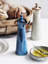 Load image into Gallery viewer, Japanese Style Ceramic Oil Vinegar Cruet by Allthingscurated is crafted from kiln-fired glazed porcelain with a glossy and smooth finish. Spots a tapered, elegant silhouette, it is perfect for storing and serving condiments from soy sauce and sesame oil, to olive oil and vingegar. Comes in 5 beautiful colors.