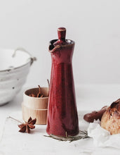 Load image into Gallery viewer, Japanese Style Ceramic Oil Vinegar Cruet by Allthingscurated is crafted from kiln-fired glazed porcelain with a glossy and smooth finish. Spots a tapered, elegant silhouette, it is perfect for storing and serving condiments from soy sauce and sesame oil, to olive oil and vingegar. Comes in 5 beautiful colors.