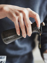 Load image into Gallery viewer, Japanese Style Ceramic Oil Vinegar Cruet by Allthingscurated is crafted from kiln-fired glazed porcelain with a glossy and smooth finish. Spots a tapered, elegant silhouette, it is perfect for storing and serving condiments from soy sauce and sesame oil, to olive oil and vingegar. Comes in 5 beautiful colors.