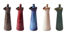 Load image into Gallery viewer, Japanese Style Ceramic Oil Vinegar Cruet by Allthingscurated is crafted from kiln-fired glazed porcelain with a glossy and smooth finish. Spots a tapered, elegant silhouette, it is perfect for storing and serving condiments from soy sauce and sesame oil, to olive oil and vingegar. Comes in 5 beautiful colors.