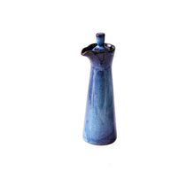 Load image into Gallery viewer, Japanese Style Ceramic Oil Vinegar Cruet by Allthingscurated is crafted from kiln-fired glazed porcelain with a glossy and smooth finish. Spots a tapered, elegant silhouette, it is perfect for storing and serving condiments from soy sauce and sesame oil, to olive oil and vingegar. Comes in 5 beautiful colors. Featured here is bottle in Blue.