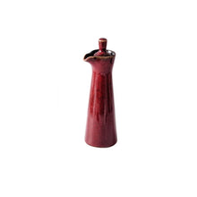 Load image into Gallery viewer, Japanese Style Ceramic Oil Vinegar Cruet by Allthingscurated is crafted from kiln-fired glazed porcelain with a glossy and smooth finish. Spots a tapered, elegant silhouette, it is perfect for storing and serving condiments from soy sauce and sesame oil, to olive oil and vingegar. Comes in 5 beautiful colors. Featured here is bottle in Red.